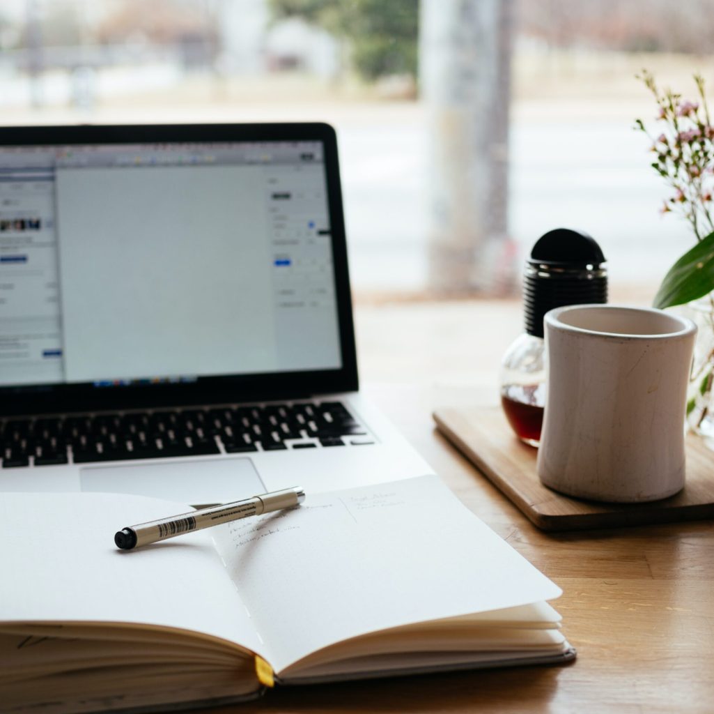 Book and laptop - Childcare Consultant in Sydney